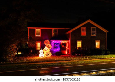 Canaan, Connecticut USA October 15, 2020 Halloween Decorations Outside A House At Night.