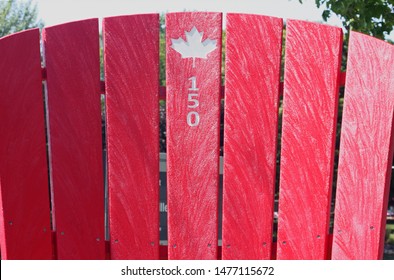 Canada 150 Large Scale Decorative Muskoka Chair. Located At The Water Front Of The Brockville Municipal Harbor On The St. Lawrence River Brockville Ontario Canada.