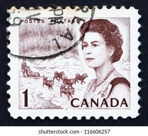 CANADA - CIRCA 1967: A Stamp Printed In The Canada Shows Northern Lights And Dog Team, Queen Elizabeth II, Circa 1967