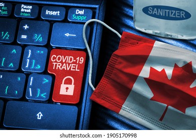 Canada COVID-19 Coronavirus Travel Restrictions Concept Showing Red Button Warning On Keyboard With Canadian Flag Face Mask And Hand Sanitizer. New Normal In Global Travel.