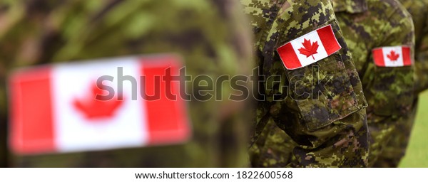 Canada Day. Flag of Canada on the military\
uniform and red Maple leaf. Canadian soldiers. Army of Canada.\
Canada leaf. Remembrance Day. Poppy day.\
