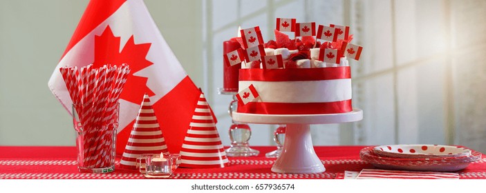 Canada Day National Holiday Celebration Party Table With Showstopper Cake And Flags, Sized To Fit A Popular Social Media Cover Image Placeholder.