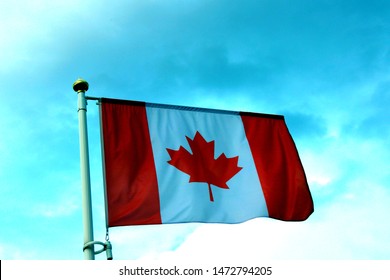 Canada Flag Against The Evening Sky