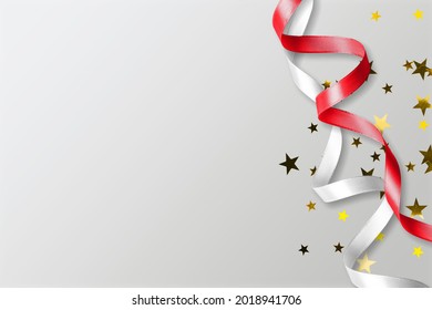 Canada flag colors red and white confetti and ribbons on desk - Powered by Shutterstock