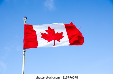 Canada Flag On Blue Sky  Background