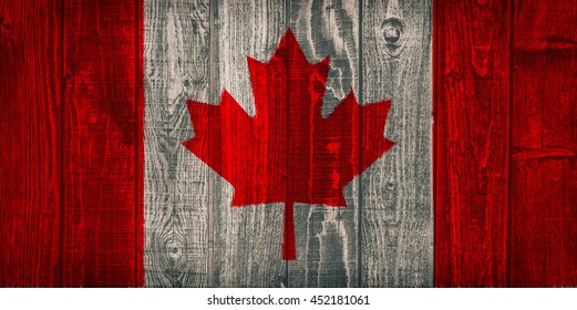 Canada Flag Painted On Old Wood Background