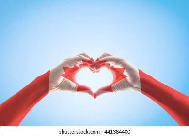 Canada Flag Pattern Red Maple Leaf On People Hands In Heart Shape For Canadian Public Holiday, National Patriots' Day, Civic/Provincial, Labour And Discovery Day  Memorial Remembrance Celebration