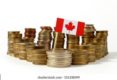 Canada flag waving with stack of money coins