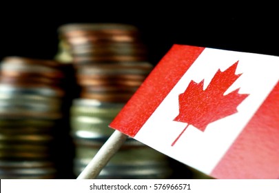 Canada Flag Waving With Stack Of Money Coins Macro