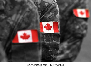 Canada Flags On Soldiers Arm. Canadian Troops