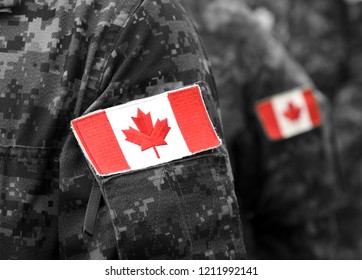 Canada Flags On Soldiers Arm. Canadian Troops