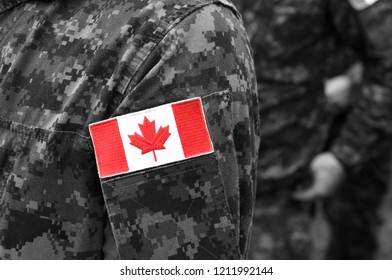 Canada Flags On Soldiers Arm. Canadian Troops