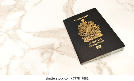 Canada Passport Book On Marble Texture Isolated Background