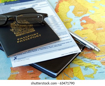 Canada passport with business travel necessities on the map - Powered by Shutterstock