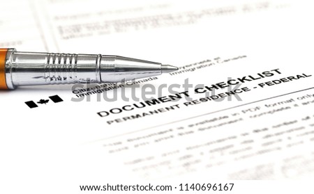 Canada Visa application form checklist with ballpoint