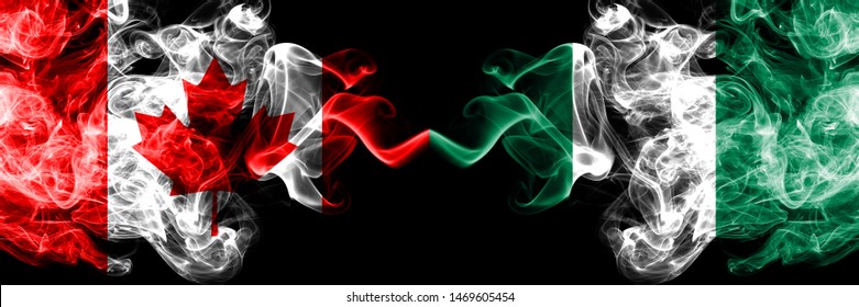 Canada vs Nigeria, Nigerian smoky mystic flags placed side by side. Thick colored silky smoke flags of Canadian and Nigeria, Nigerian