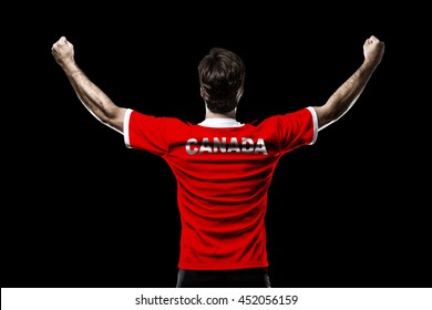 Canadian Athlete Winning A Golden Medal On A Black Background.