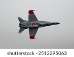 Canadian CF-18 Hornet fighter jet at RIAT 2024, fly by, bottom view