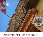 Canadian Chamber of Commerce with Canadian Flag outside Building