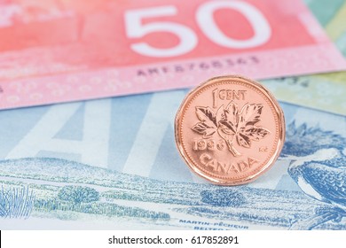 Canadian Coin Dollar Stand On Canada Banknote Money