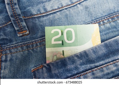 Canadian Dollar In A Jeans Pocket