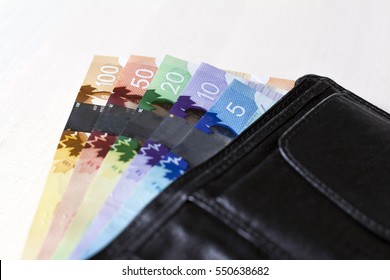 Canadian Dollars In A Open Black Leather Vallet