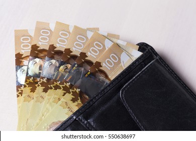 Canadian Dollars In A Open Black Leather Vallet