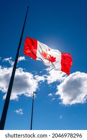 A Canadian Flag Flies At Half Staff In Honour Of Indigenous Residential School Survivors.
