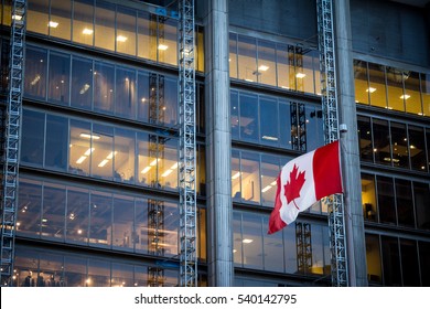 Canadian Flag In Front Of A Business Building In Toronto, Ontario, Canada