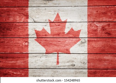 Canadian Flag On Wood Texture Background