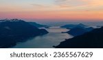 Canadian Mountain Landscape on the West Coast of Pacific Ocean. Aerial Nature Background. Sunset Sky. Howe Sound, British Columbia, Canada.
