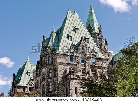 The Canadian Parliament Confederation Building seen from the West side in Ottawa, Canada.
