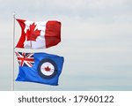 Canadian and RCAF flags in the wind