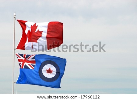Canadian and RCAF flags in the wind