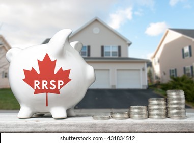 Canadian Registered Retirement Savings Plan Concept With Piggy Bank And Coins Stacks