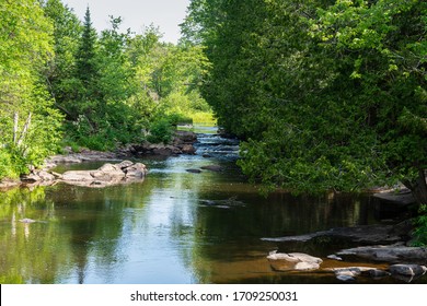 Canadian River Creek with low flow stream running through beautiful rugged rocky terrain