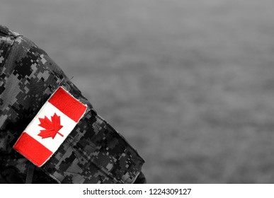 Canadian Troops. Canadian Army. Canada Flags On Soldiers Arm. 