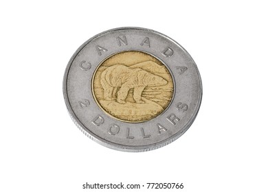 Canadian two-dollars coin isolated on white background closeup