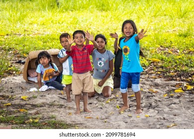 Canaima, Venezuela - 11-18-2021: Native Local Kids Happy Greeting Visitors