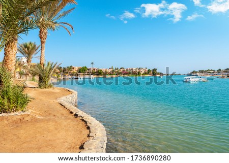 Canal, boats and houses at El Gouna town. Egypt, North Africa
