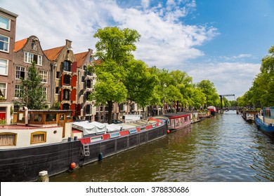 Canal And Bridge In Amsterdam In A Summer Day, Netherlands 