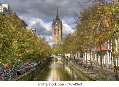 Canal and Old Church tower of Delft, Holland