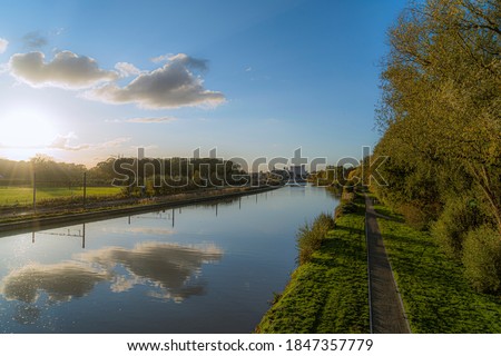 Canal Roeselare Leie, reflection of clouds in the water with the view in the direction of Izegem.  Connection road Jagerspad leading from Ingelmunster.  Toeristic pic of the unknown side of flanders