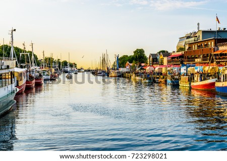 canal with ships and Baltic Sea in Warnemuende, Rostock Germany