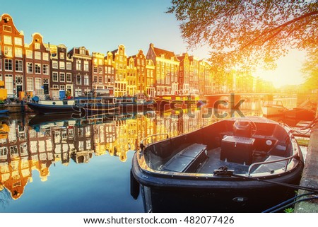 Canal at sunset. Amsterdam is the capital and most populous city in Netherlands. 
