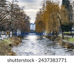 Canal surrounded by trees in Dubendorf, Switzerland