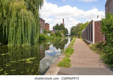 Canal And Towpath In Summer
