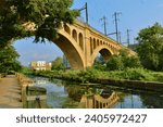 canal and train bridge over tow path on manayunk tow path