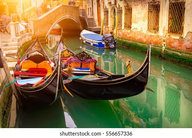 Canal with two gondolas in Venice, Italy. Architecture and landmarks of Venice. Venice postcard with Venice gondolas.