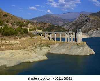 Canales reservoir, Guejar Sierra, province of Granada, Andalusia, Spain.  Is located in Genil riverberd and belong to the Confederacion Hidrografica del Guadalquivir.  - Shutterstock ID 1022638822